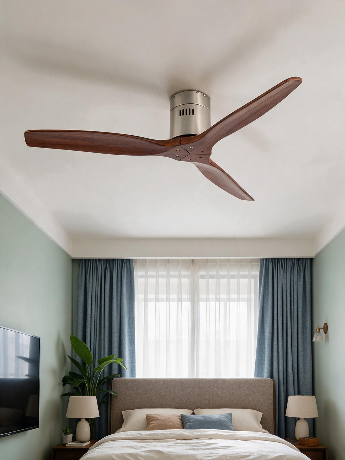 Wooden ceiling fan mounted in a bedroom