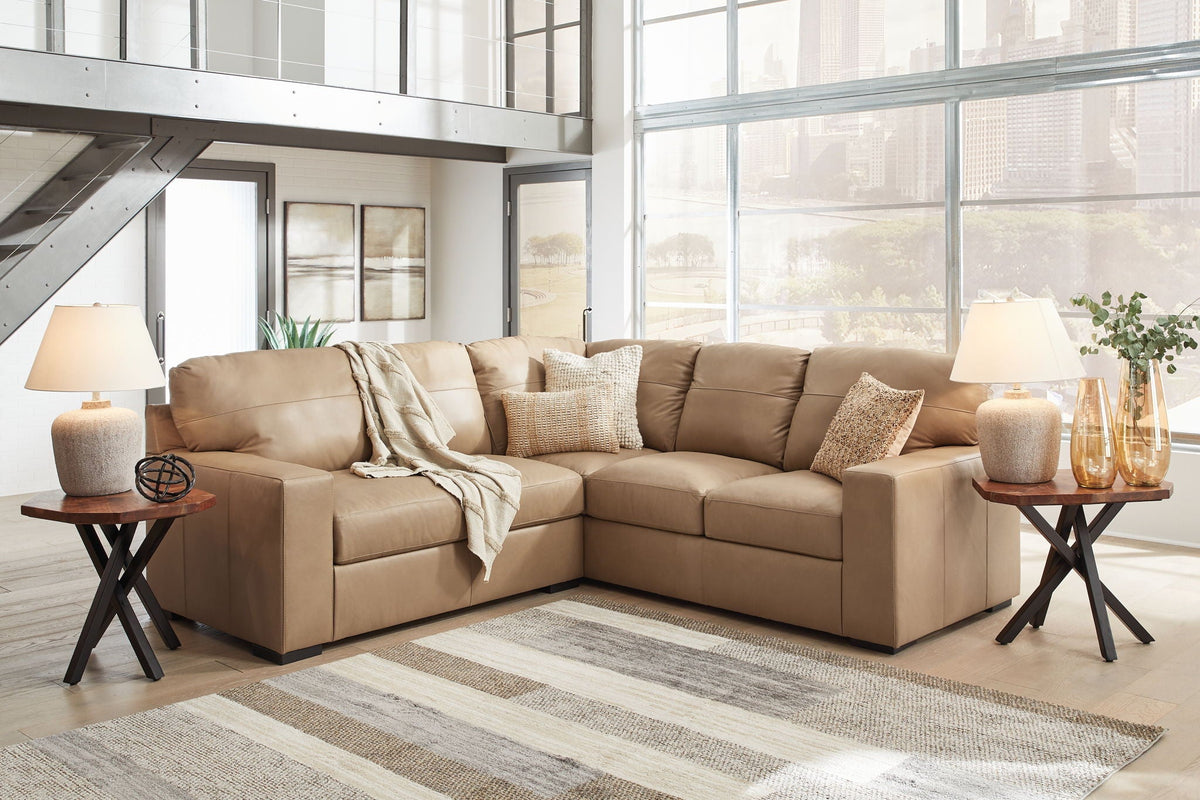 Sectional sofa and ottoman styled in a living room