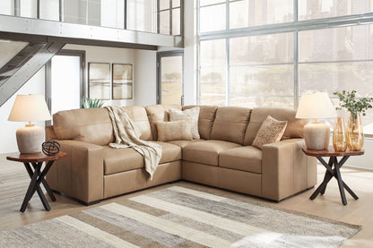 Sectional sofa and ottoman styled in a living room