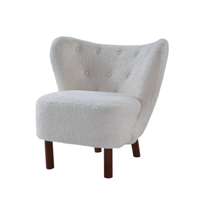 Close view of the teddy sherpa upholstery and wood leg