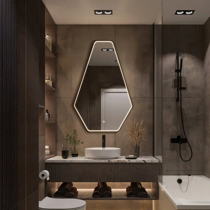 Irregular LED mirror lit in a modern bathroom