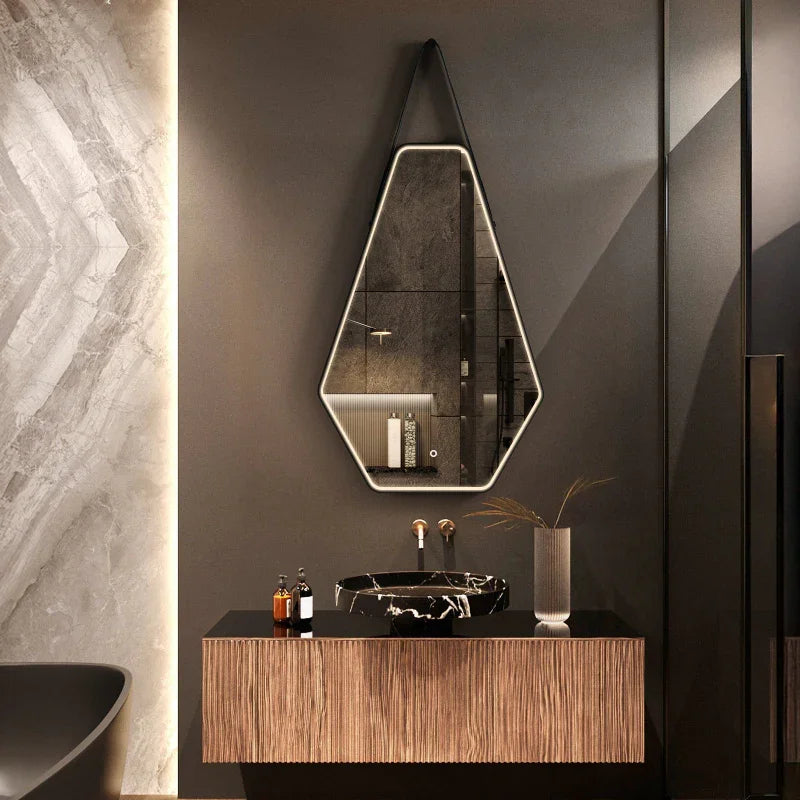 Irregular LED bathroom mirror mounted above vanity