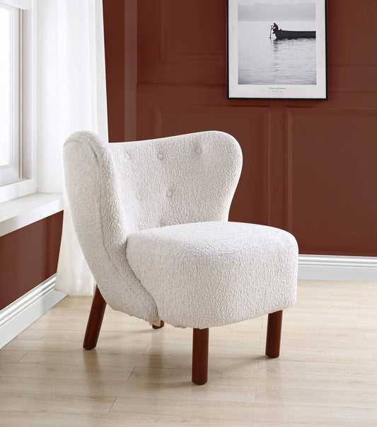 White sherpa wingback accent chair shown in a room setting