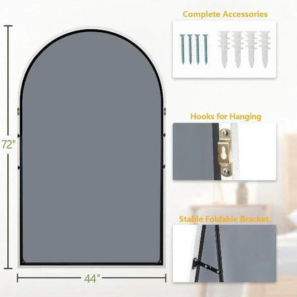 White arched floor mirror viewed at an angle against a plain background