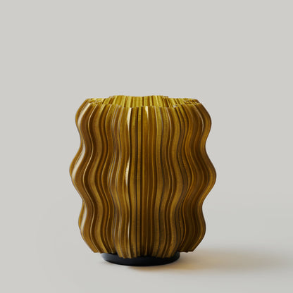 Cordless mini wavy lamp shown from the side