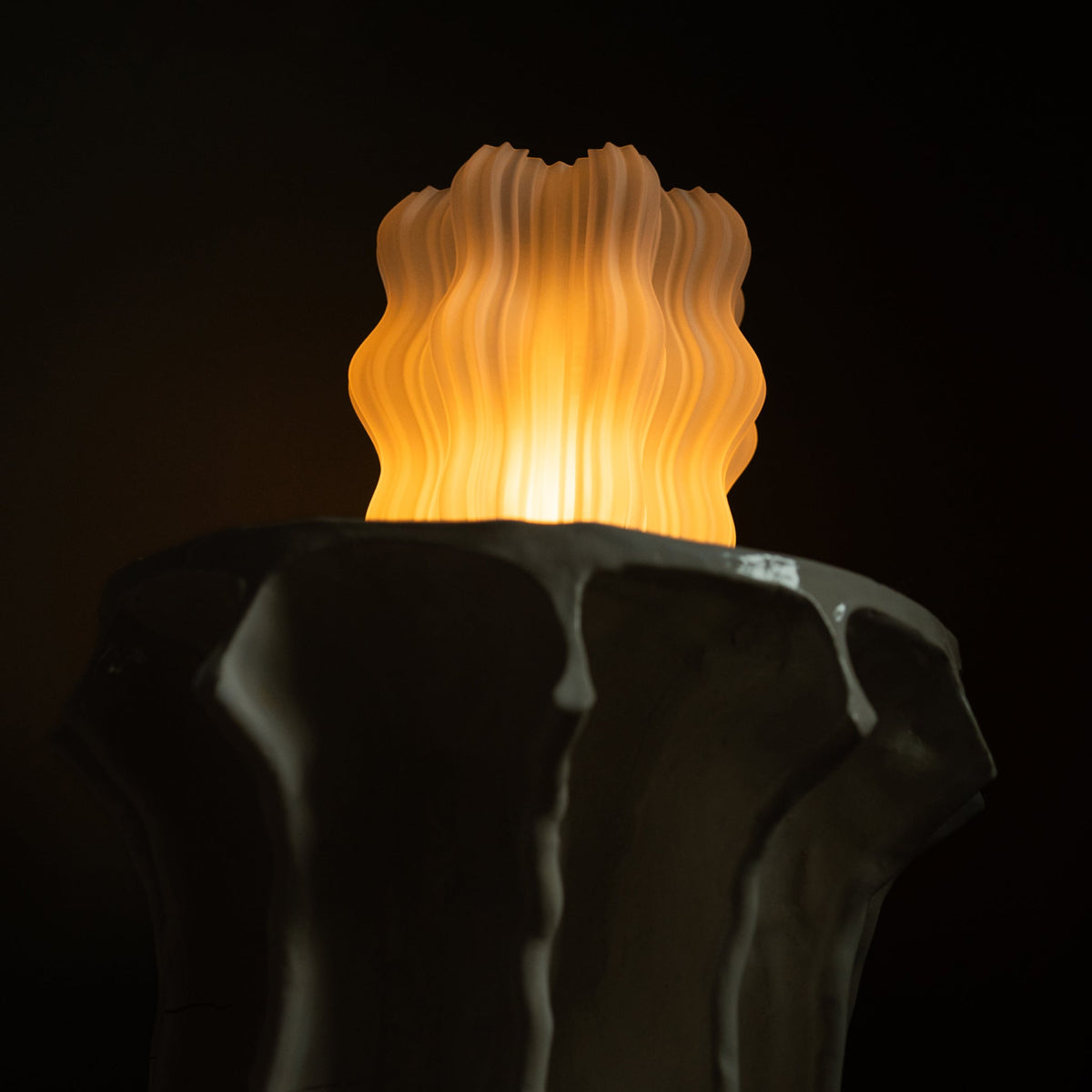Detail of where the shade meets the base on the mini wavy lamp