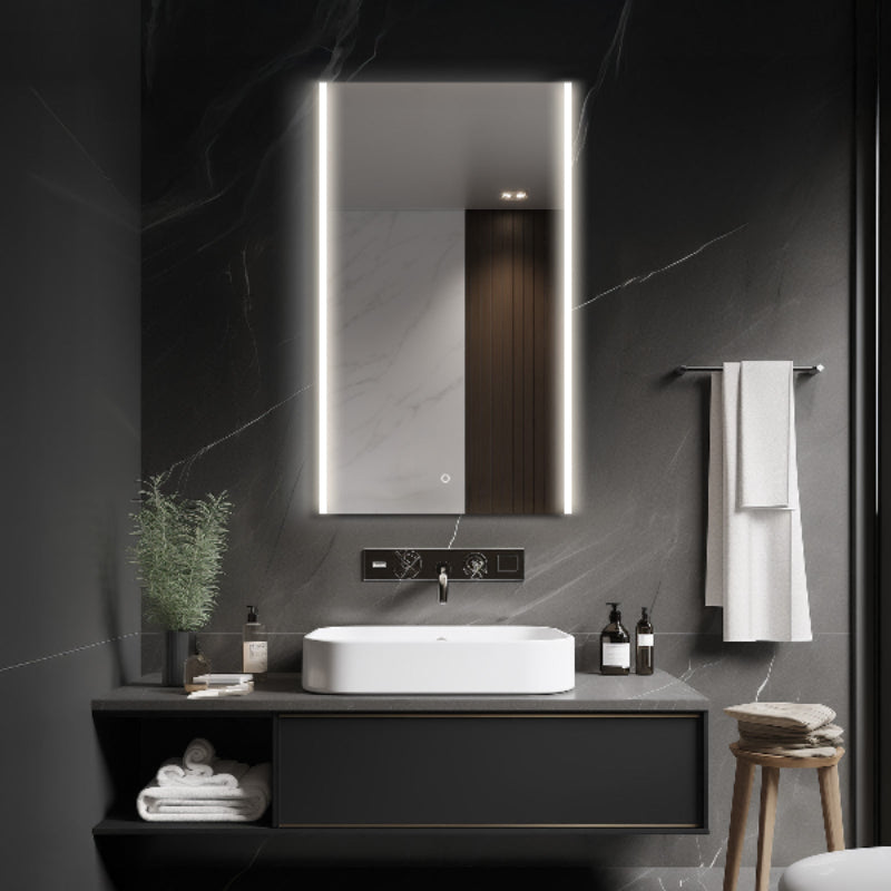 Front lit LED bathroom mirror shown above a vanity in a bathroom
