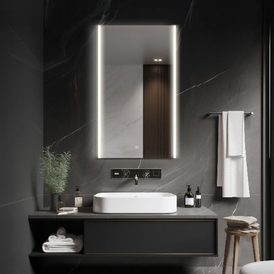 Front lit LED bathroom mirror shown above a vanity in a bathroom