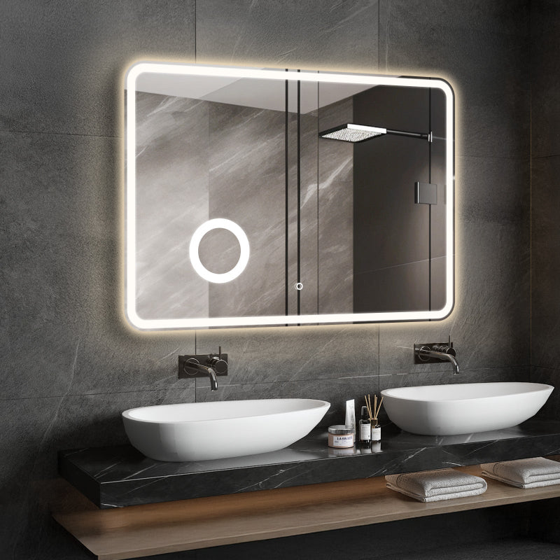 LED bathroom mirror with 3X magnifier above vanity