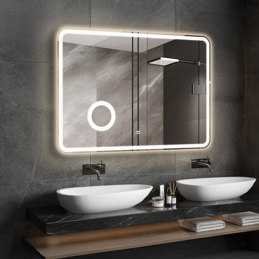 LED bathroom mirror with 3X magnifier above vanity