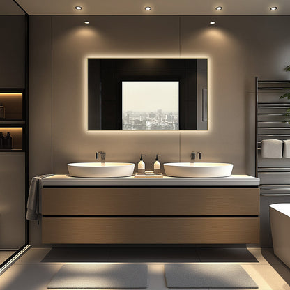 Backlit brushed gold LED mirror shown above a vanity in a bathroom