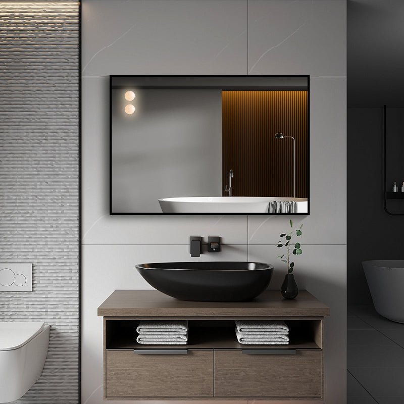Matte black frame close-up on rectangular LED mirror