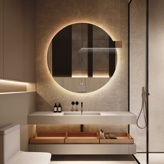 Round backlit LED bathroom mirror glowing on wall