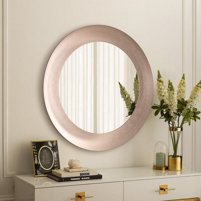 Round rose gold LED mirror shown above a vanity in a bathroom