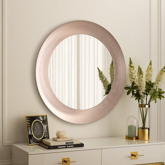 Round rose gold LED mirror shown above a vanity in a bathroom