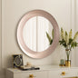 Round rose gold LED mirror shown above a vanity in a bathroom