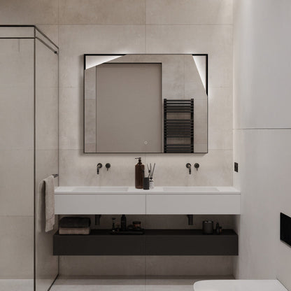 LED mirror with irregular cutout design above vanity