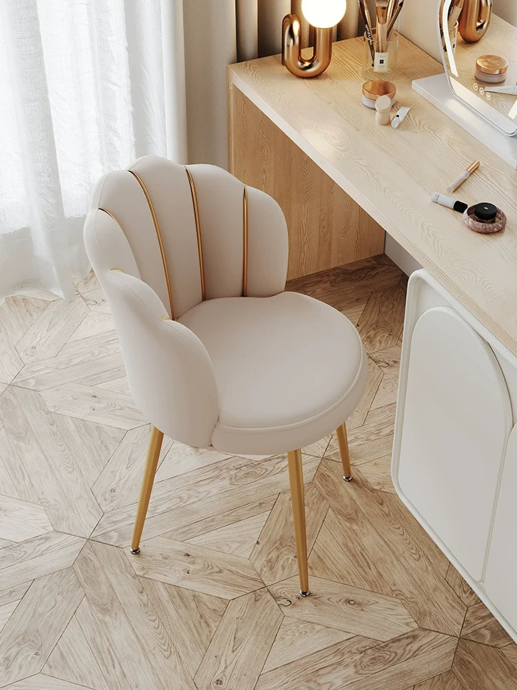 Close-up of cushioned seat on vanity chair
