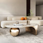 Oval marble-top coffee table on a metal base in a modern living room