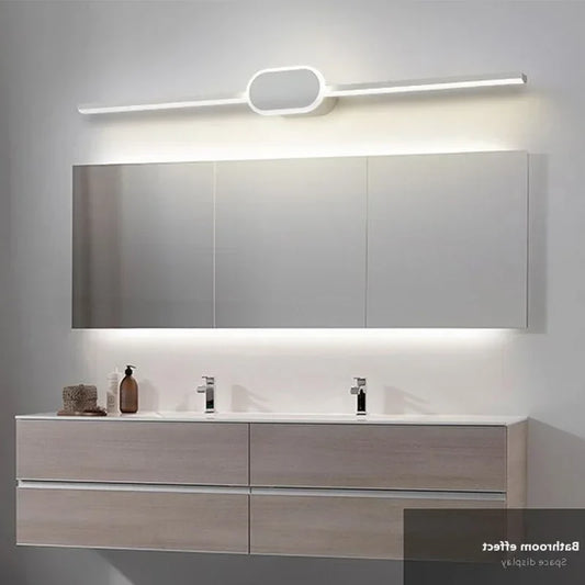LED wall light mounted above a bathroom mirror