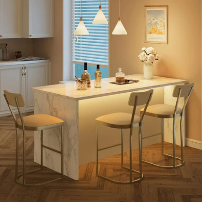 Gray upholstered seat detail on bar stool