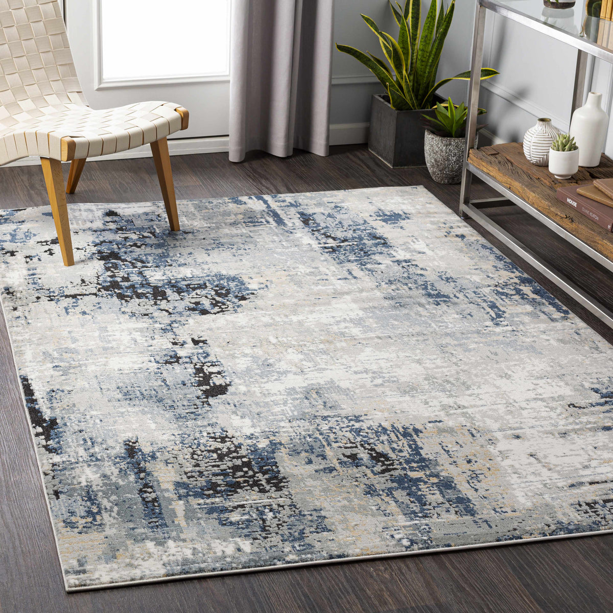 Abstract patterned rug photographed flat against a plain background